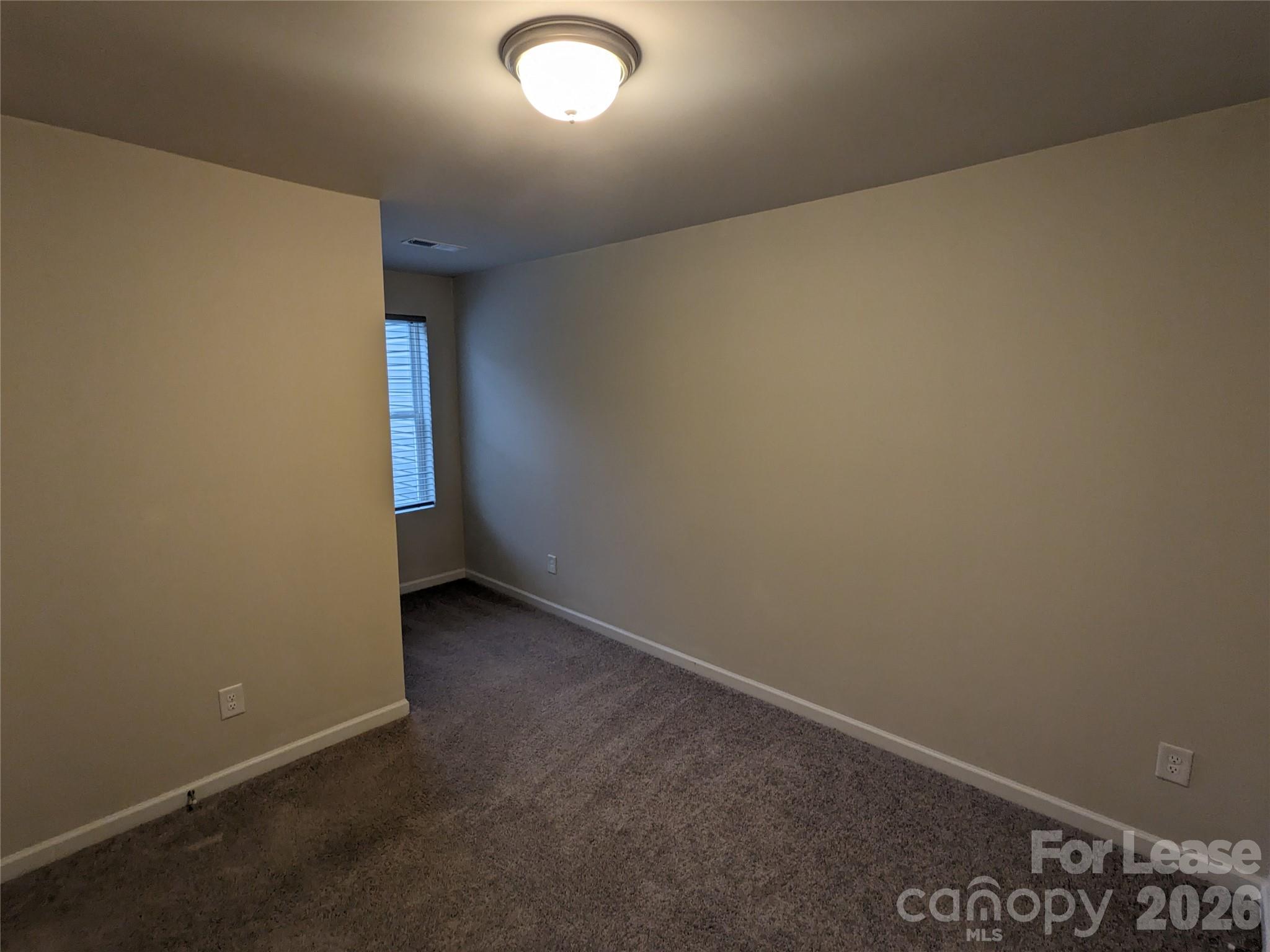 237 Century Drive Salisbury, NC 28147 - Photo 9 of 9 an empty room with a door