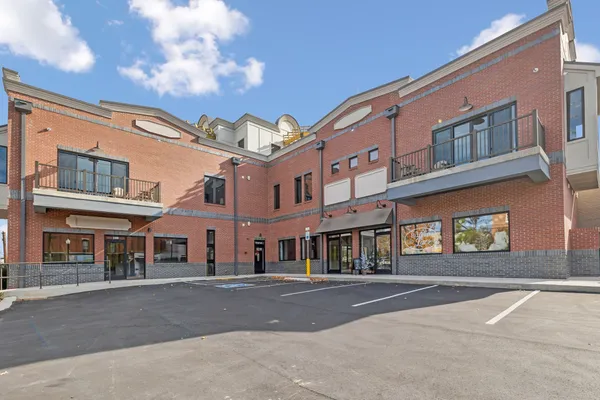 a view of a building with a street