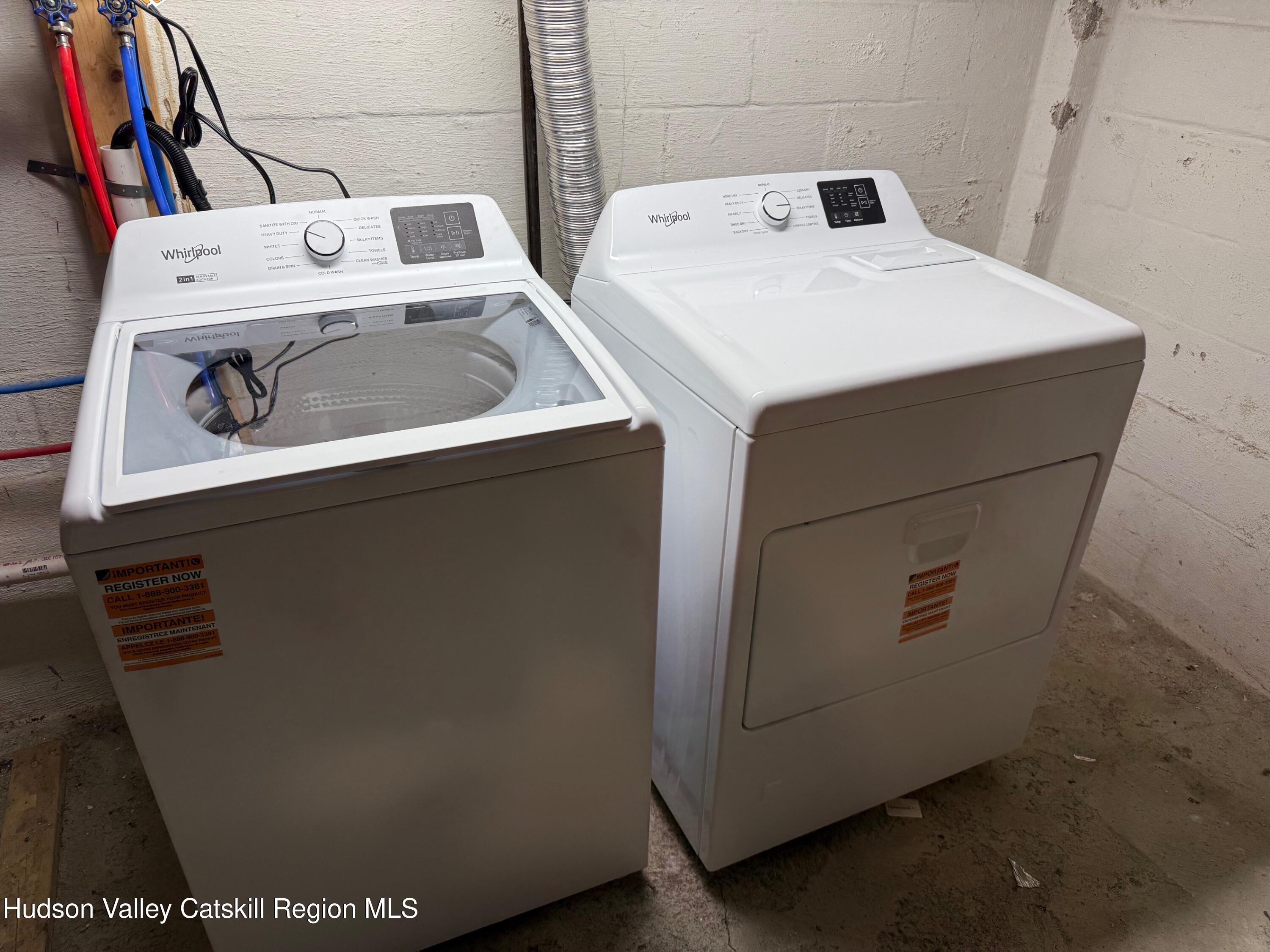 4 Frederick Street Hudson, NY 12534 - Photo 12 of 14 a utility room with dryer and washer