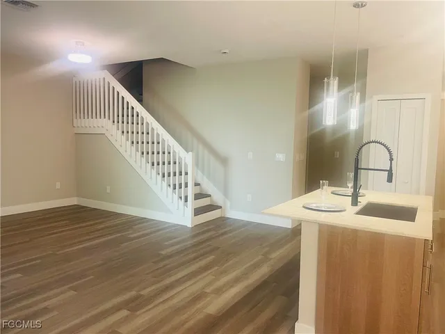 a en suite bathroom with a sink and mirror