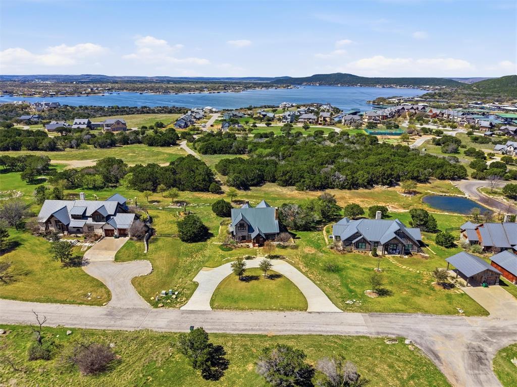 1080 Cascade Lane Graford, TX 76449 - Photo 1 of 39 an aerial view of a house with a garden
