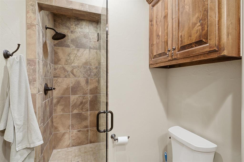 1080 Cascade Lane Graford, TX 76449 - Photo 22 of 39 a bathroom with a shower