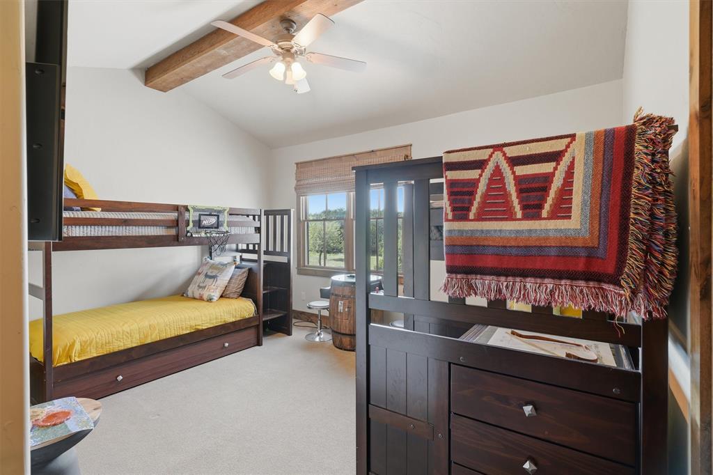 1080 Cascade Lane Graford, TX 76449 - Photo 23 of 39 a bedroom with a bed and furniture