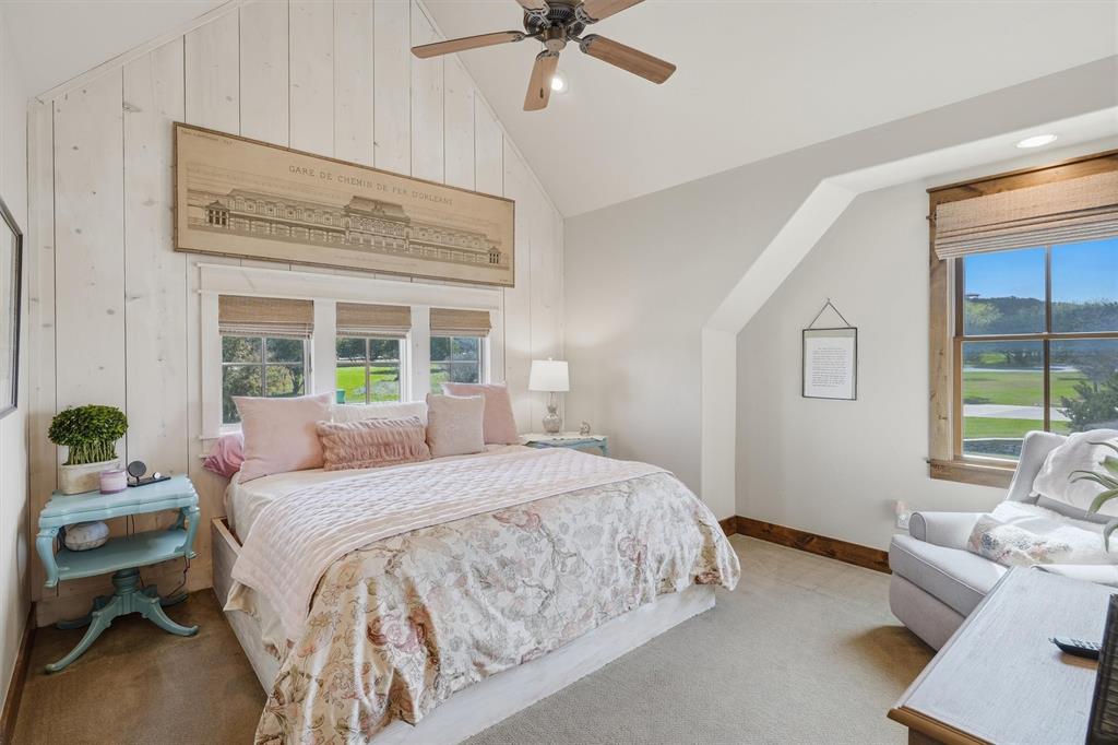 1080 Cascade Lane Graford, TX 76449 - Photo 25 of 39 a bedroom with a bed and wooden floor