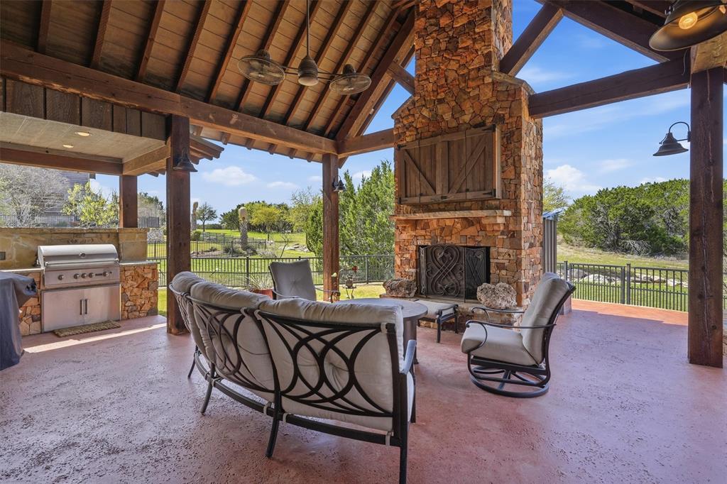 1080 Cascade Lane Graford, TX 76449 - Photo 30 of 39 a view of a patio with a table and chairs