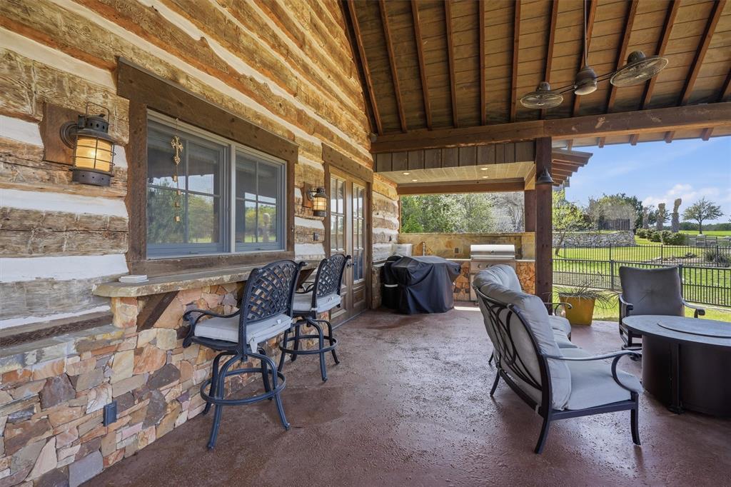1080 Cascade Lane Graford, TX 76449 - Photo 31 of 39 a building outdoor space with patio furniture and garden view