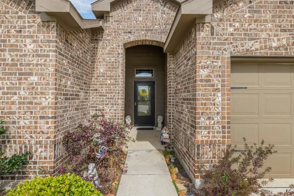 a front view of a house with garage
