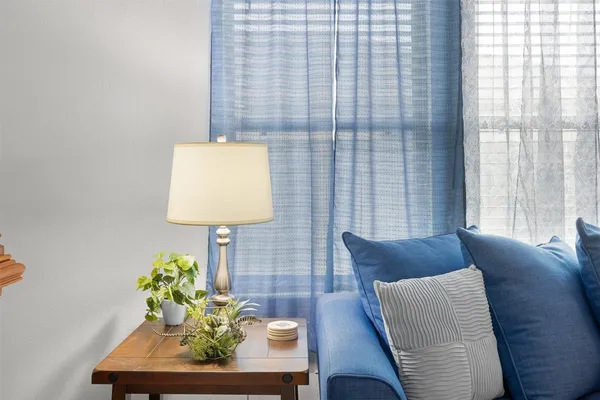 a living room with furniture and view of living room