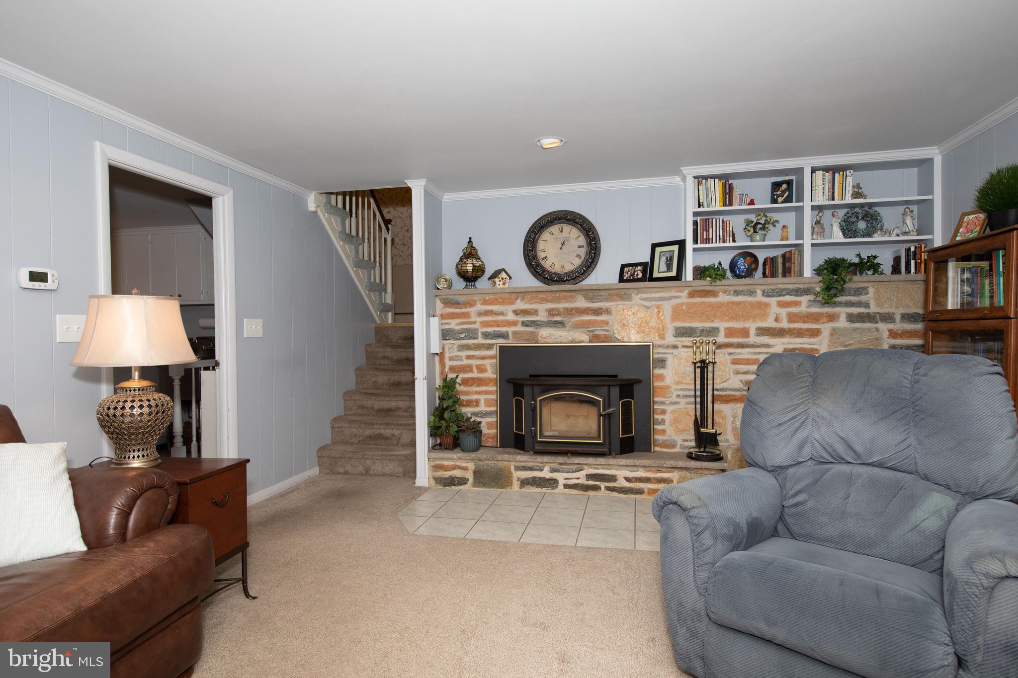 1025 Larch Circle Blue Bell, PA 19422 - Photo 17 of 37 Large Family Room with cozy fireplace