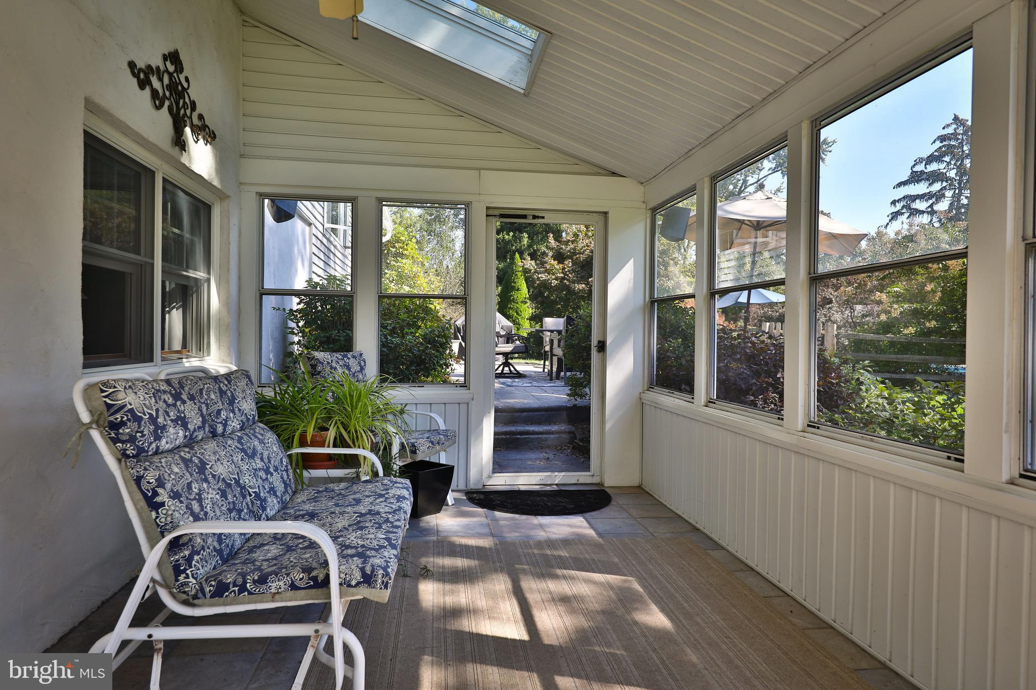 1025 Larch Circle Blue Bell, PA 19422 - Photo 19 of 37 leads to screened in porch