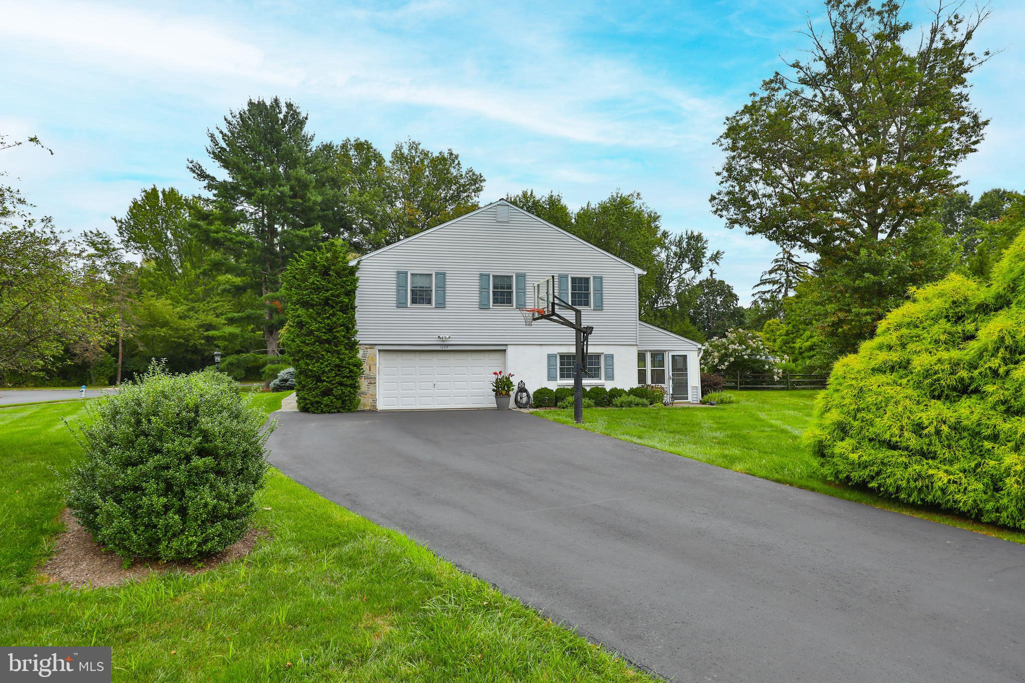 1025 Larch Circle Blue Bell, PA 19422 - Photo 2 of 37 with oversized driveway and attached garage