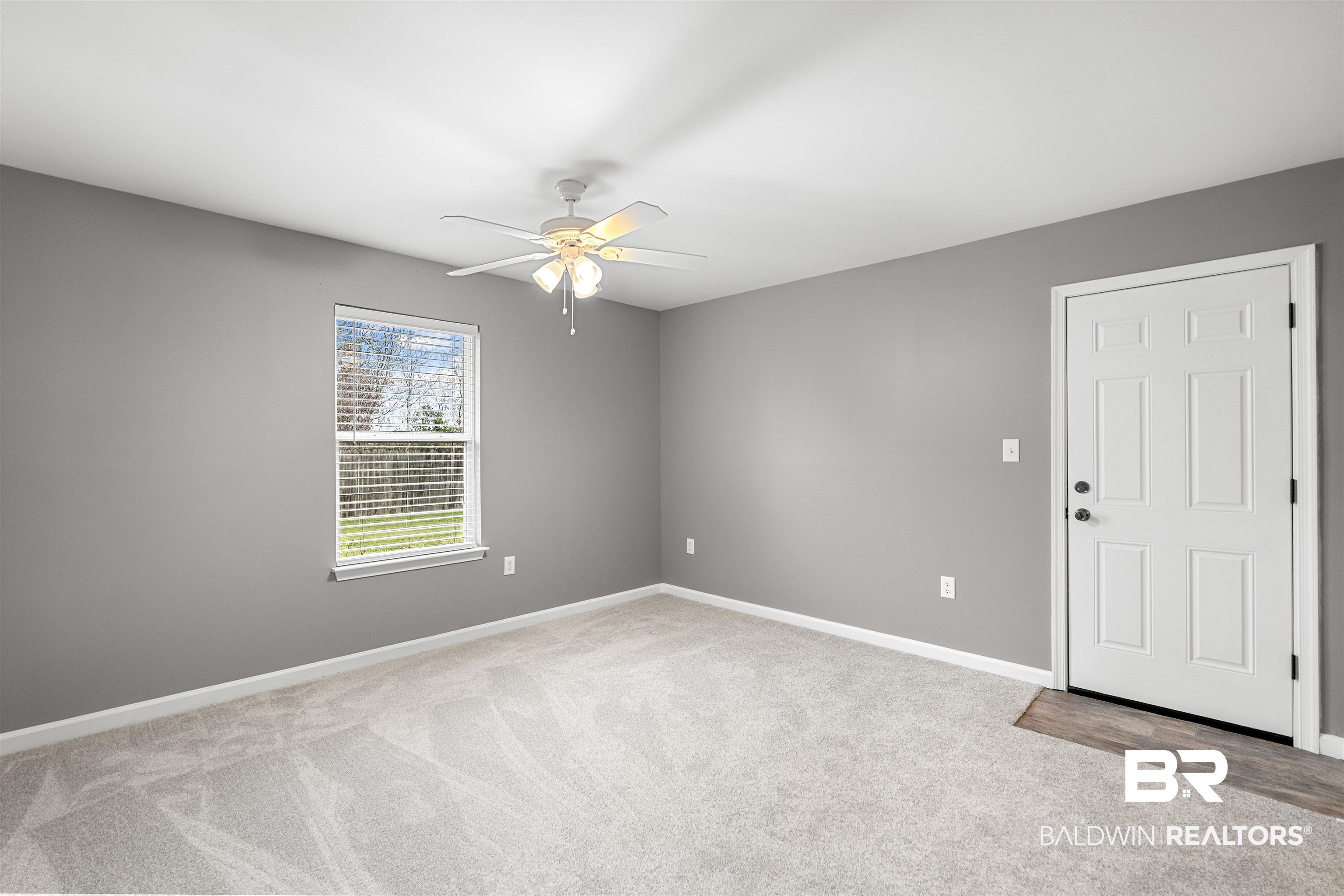 15131 Marem Drive Foley, AL 36535 - Photo 6 of 13 Unfurnished room with light carpet and ceiling fan