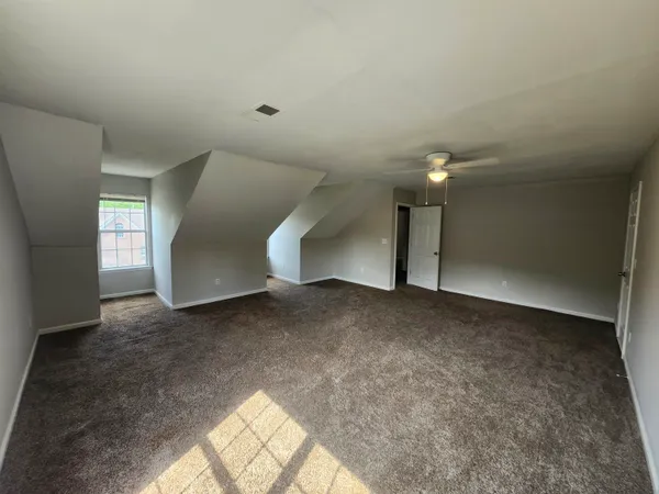 a view of a room with windows