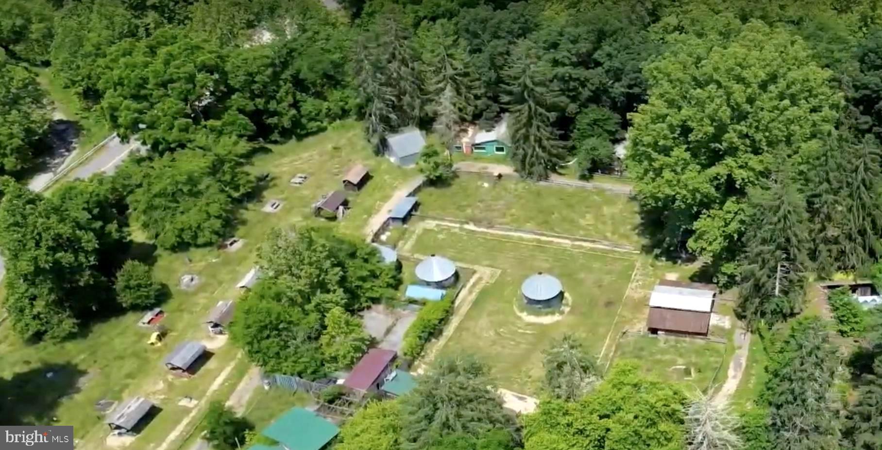 10105 Cottage Inn Lane Northeast Cumberland, MD 21502 - Photo 4 of 20 an aerial view of a residential houses with yard