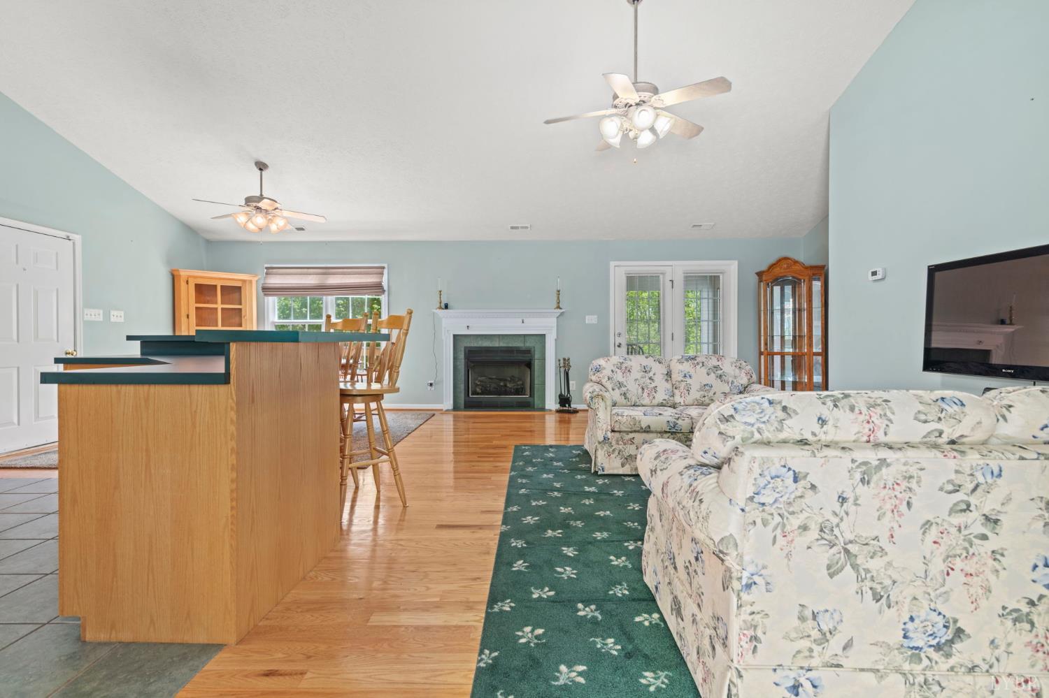 298 Braxton Ridge Road Amherst, VA 24521 - Photo 6 of 65 a living room with furniture and a chandelier