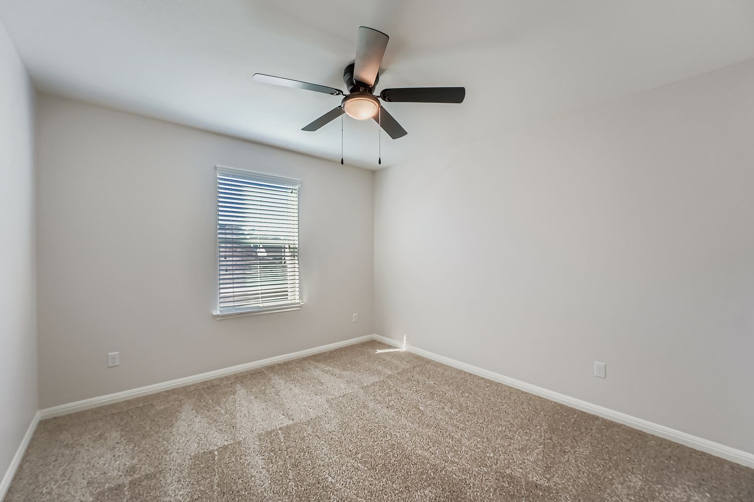 14013 Mark Christopher Way Manor, TX 78653 - Photo 18 of 28 a view of an empty room with a window