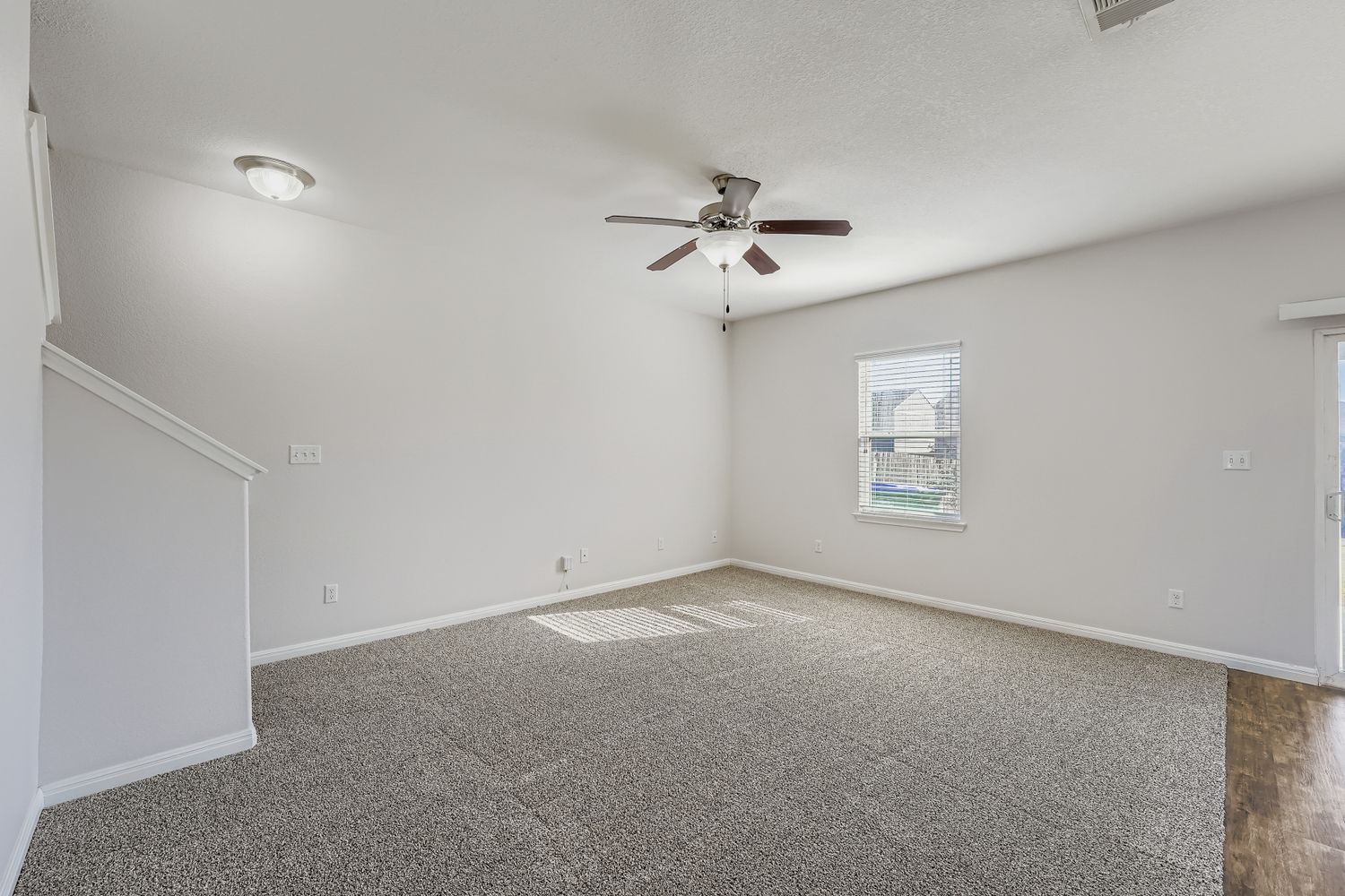 14013 Mark Christopher Way Manor, TX 78653 - Photo 3 of 28 a view of room with a ceiling fan