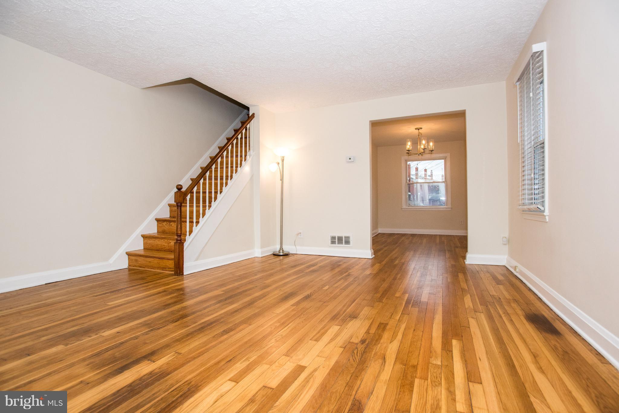 240 Orville Road Baltimore, MD 21221 - Photo 3 of 27 Living Room/Front to back view
