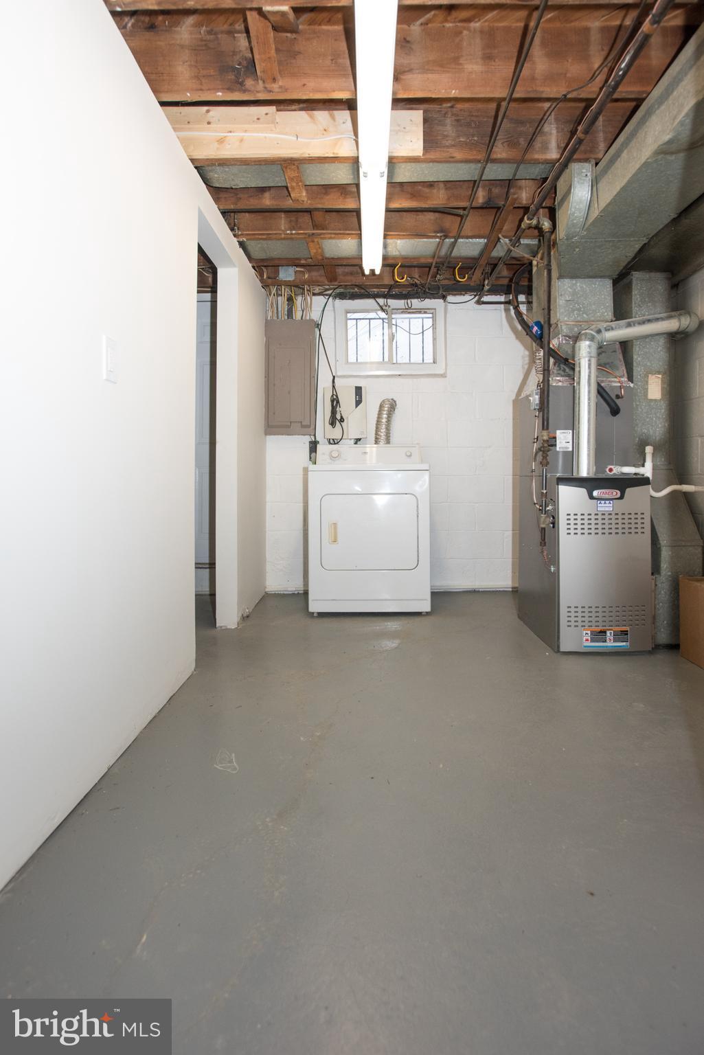 240 Orville Road Baltimore, MD 21221 - Photo 26 of 27 Utility room/basement entrance/exit off to left