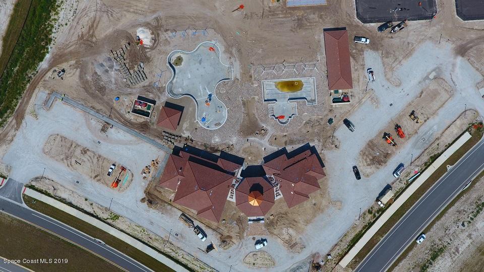 3631 Stabane Place Melbourne, FL 32940 - Photo 22 of 47 an aerial view of residential house with parking