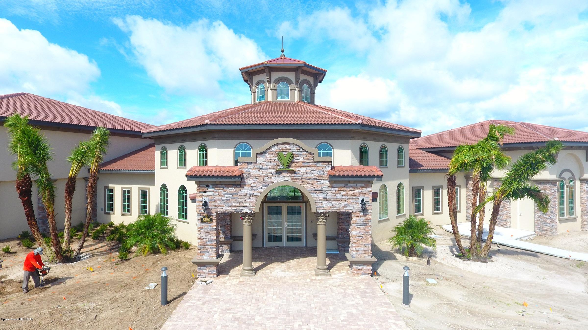 3631 Stabane Place Melbourne, FL 32940 - Photo 24 of 47 a front view of a house with a yard