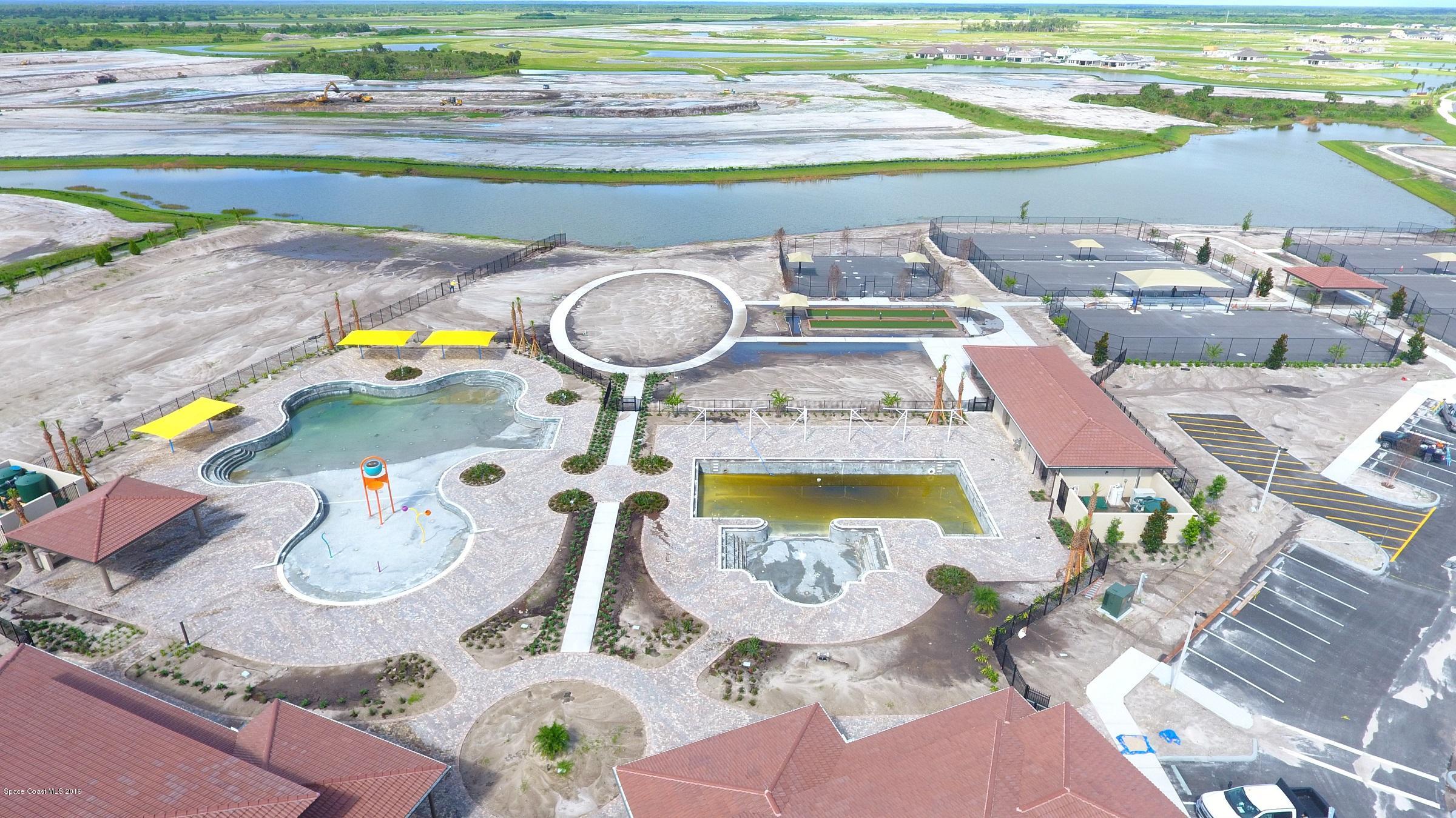 3631 Stabane Place Melbourne, FL 32940 - Photo 26 of 47 a dining table with wooden floor