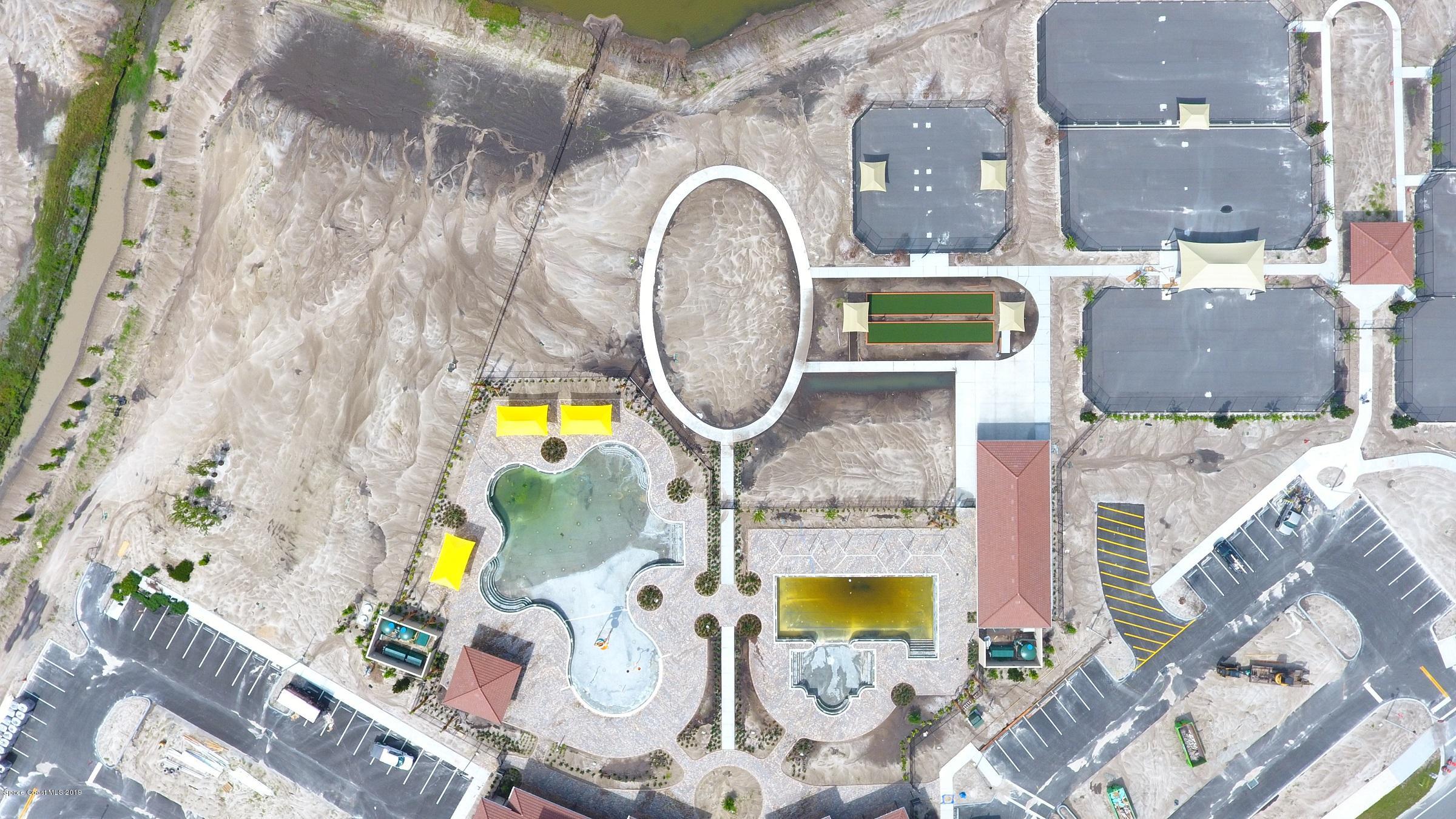 3631 Stabane Place Melbourne, FL 32940 - Photo 27 of 47 a picture of a bathroom with a sink and mirror with bathtub