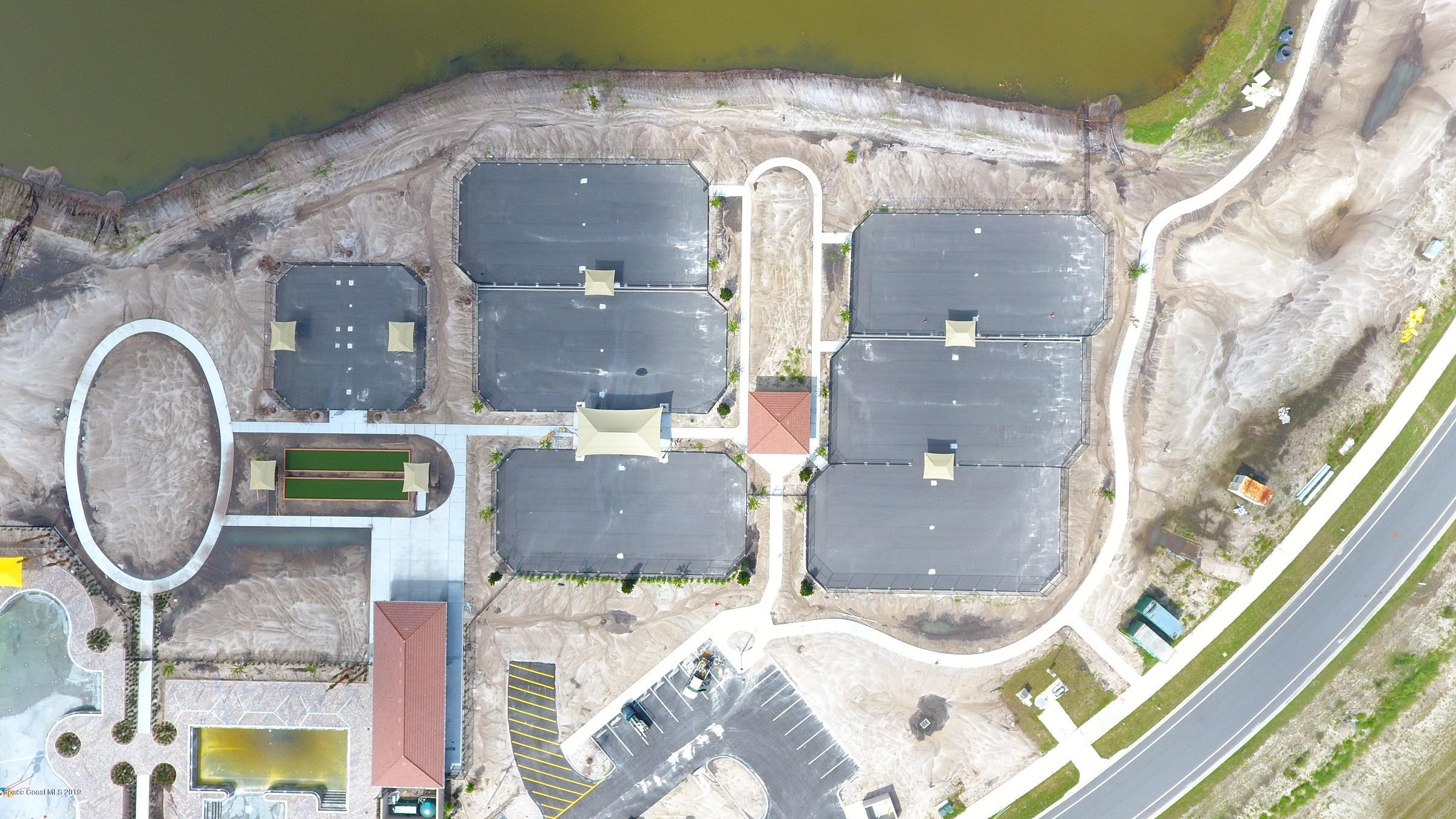 3631 Stabane Place Melbourne, FL 32940 - Photo 28 of 47 a bathroom with a sink and a mirror