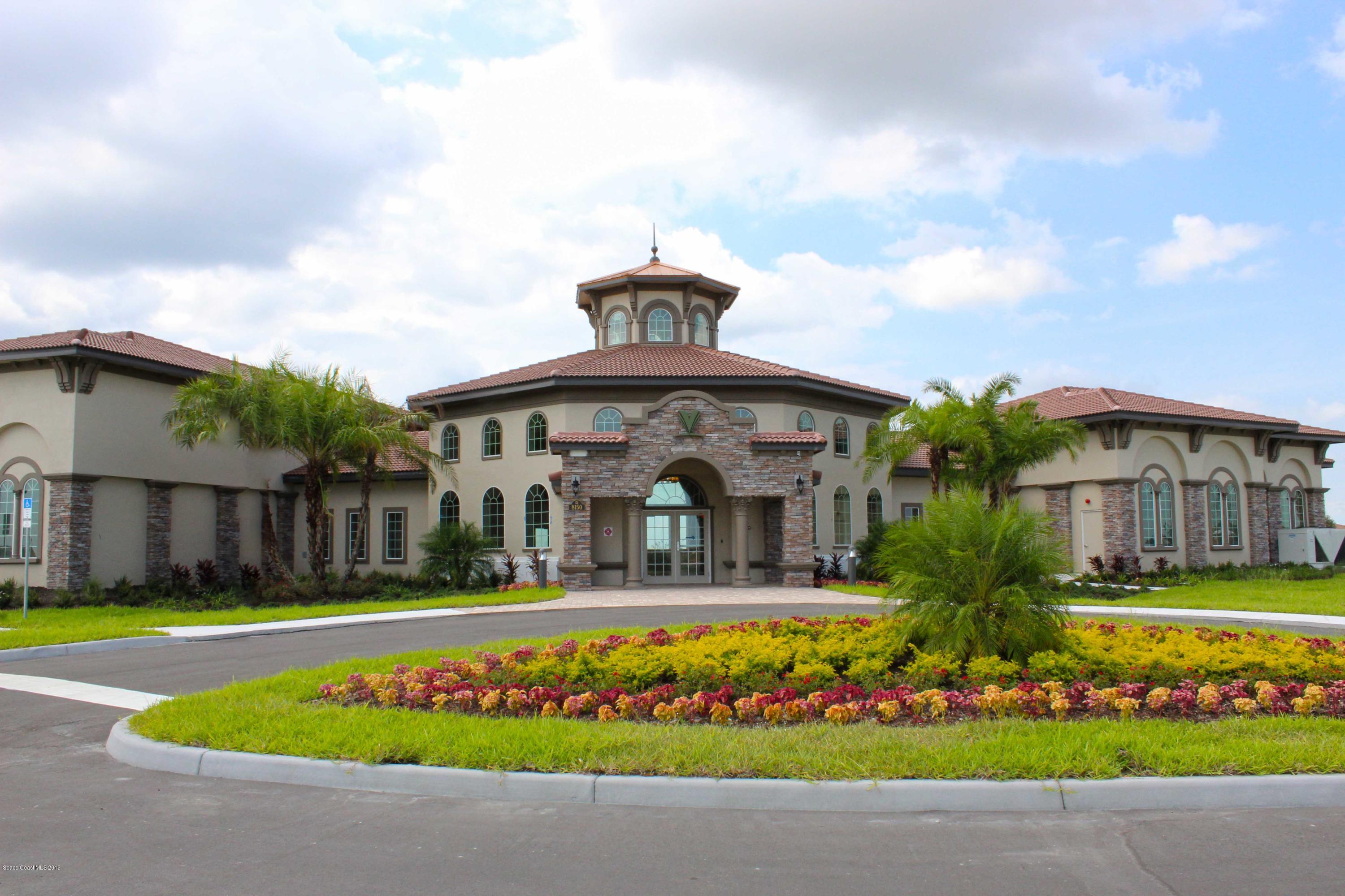 3631 Stabane Place Melbourne, FL 32940 - Photo 33 of 47 a front view of a house with a yard