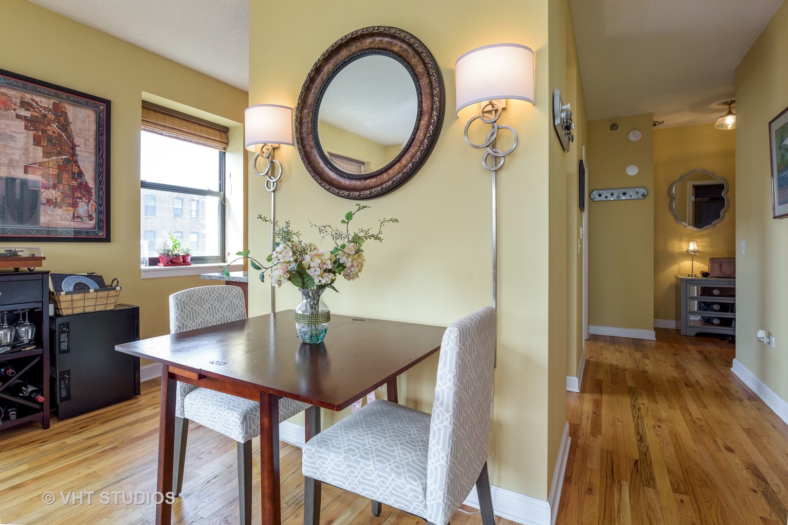 1529 South State Street, Unit 8B Chicago, IL 60605 - Photo 5 of 11 a view of a dining room with furniture window and wooden floor