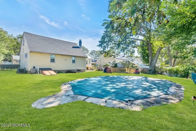 a view of a backyard with garden