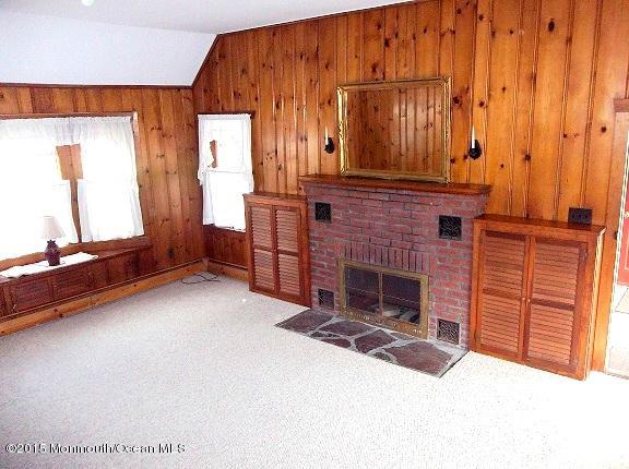 Brick fireplace adds cozy note to living