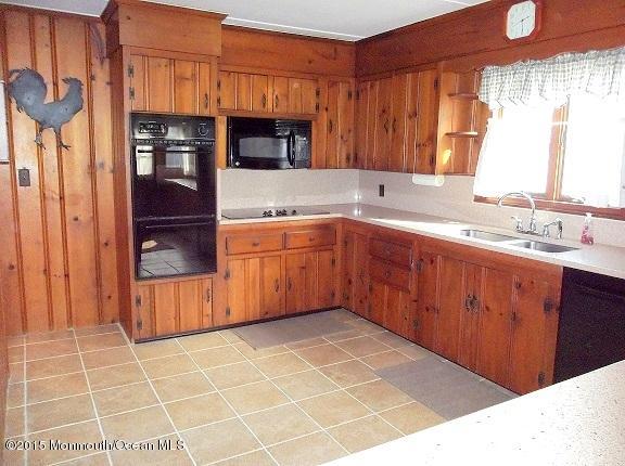 Natural wood cabinets and smart styling