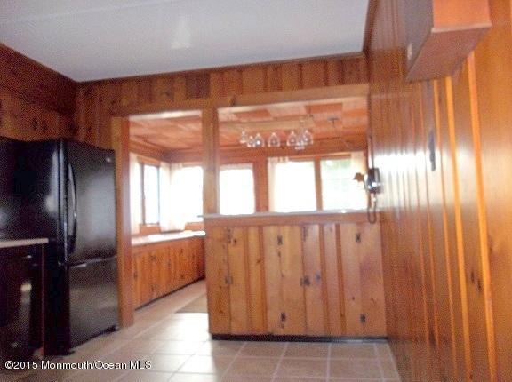 Snak bar leading to open family room.