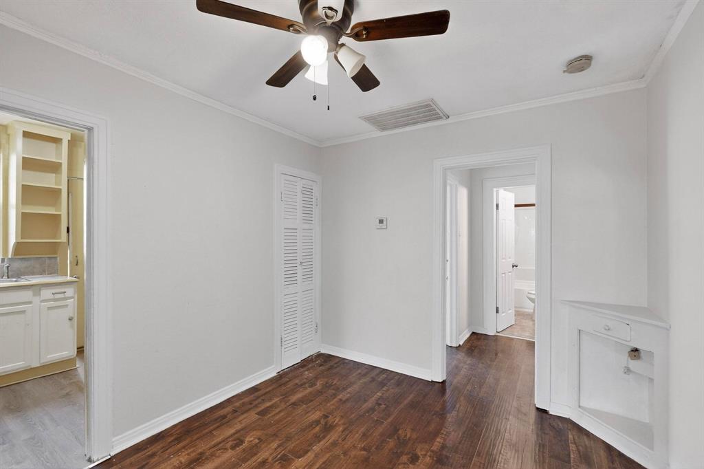 5020 Pershing Street Dallas, TX 75206 - Photo 17 of 30 wooden floor in an empty room with a window