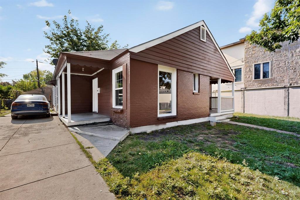 5020 Pershing Street Dallas, TX 75206 - Photo 22 of 30 a front view of a house with a yard