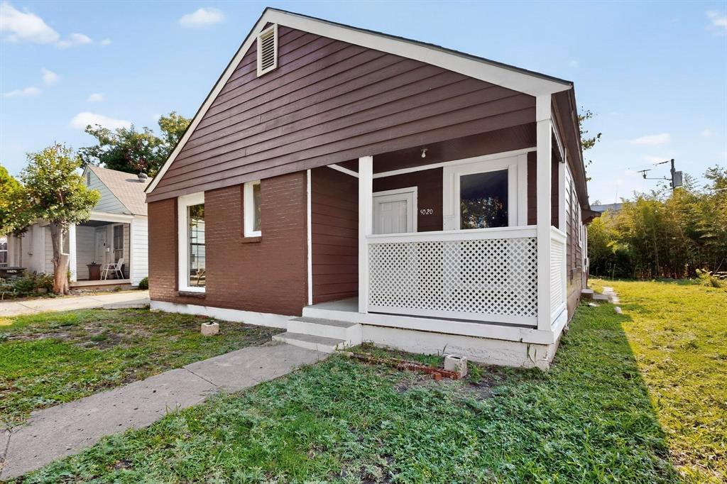 5020 Pershing Street Dallas, TX 75206 - Photo 4 of 30 front view of a house with a yard