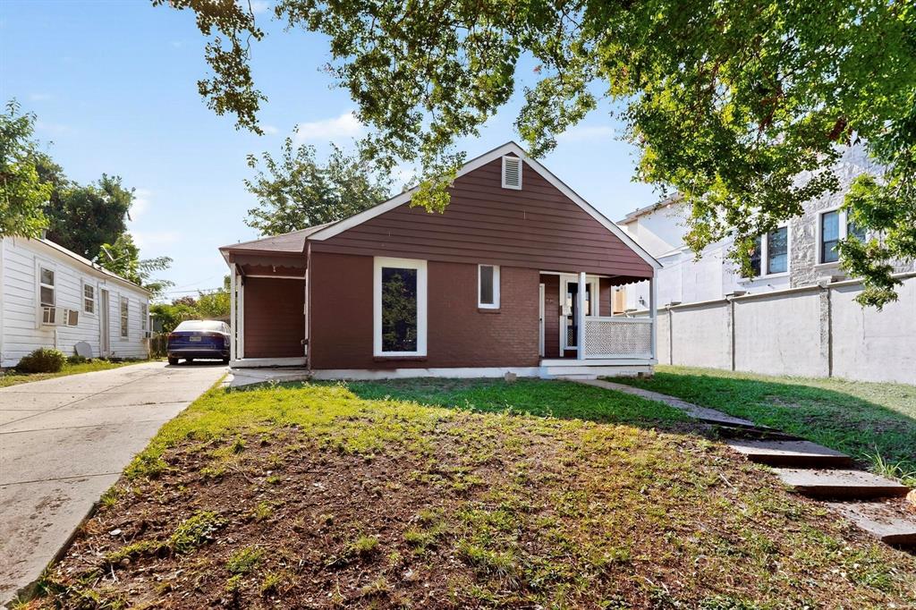 5020 Pershing Street Dallas, TX 75206 - Photo 5 of 30 a front view of a house with garden