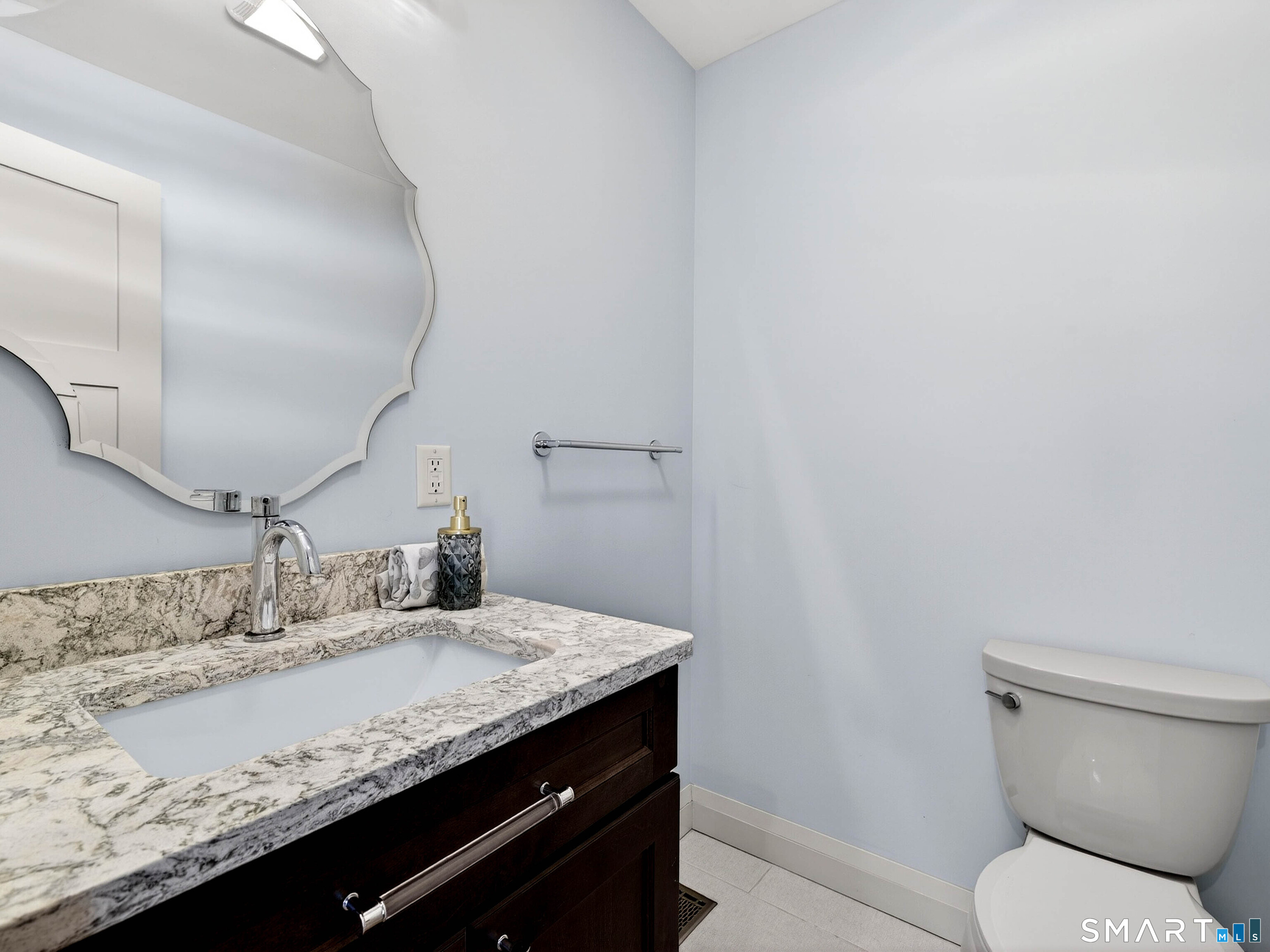 34-1 Johnny Cake Hill Road Old Lyme, CT 06371 - Photo 20 of 40 a bathroom with a granite countertop sink and a mirror