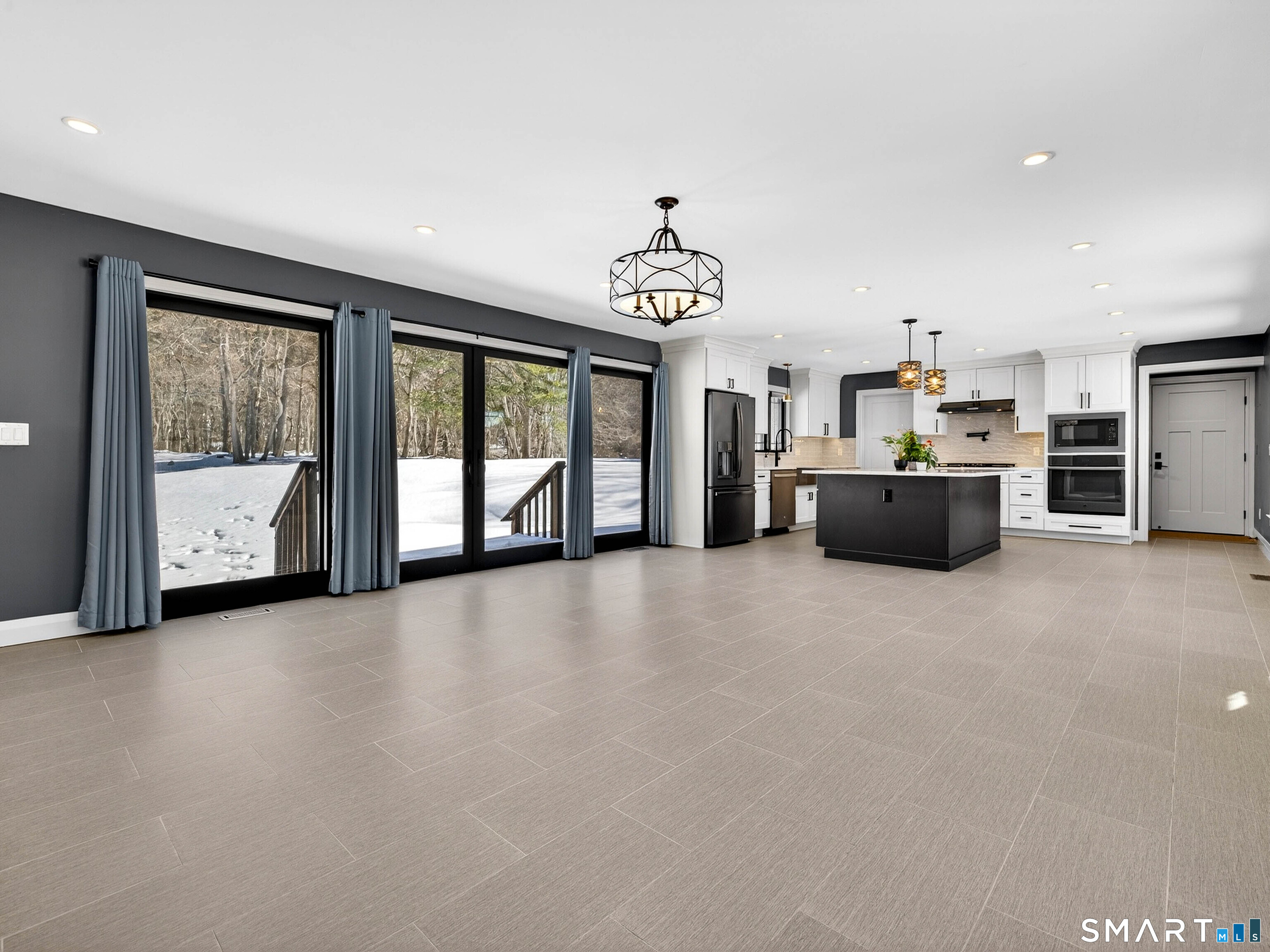 34-1 Johnny Cake Hill Road Old Lyme, CT 06371 - Photo 25 of 40 a view of a kitchen with a stove cabinets and a kitchen