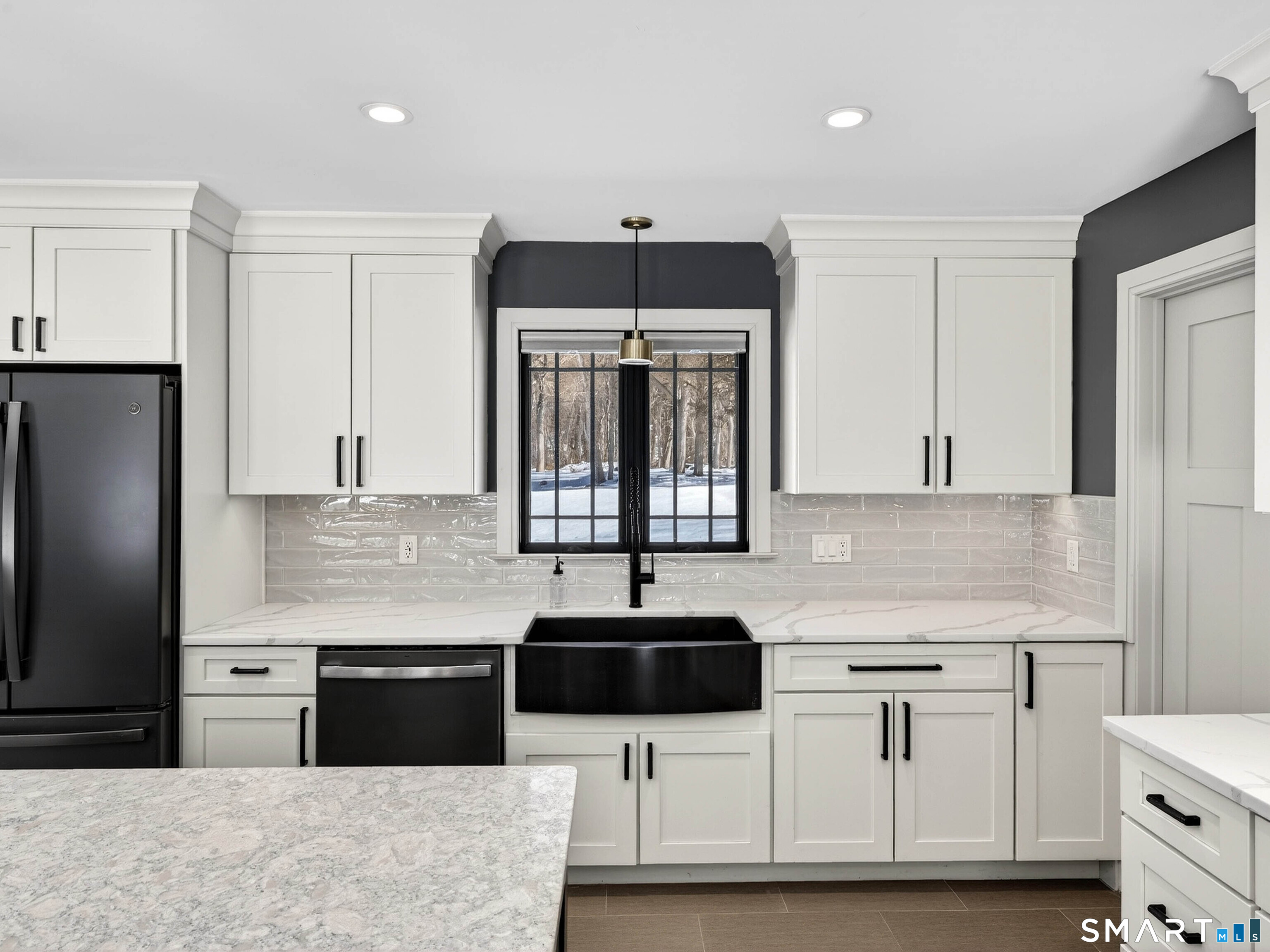 34-1 Johnny Cake Hill Road Old Lyme, CT 06371 - Photo 27 of 40 a kitchen with stainless steel appliances a stove a sink and a refrigerator