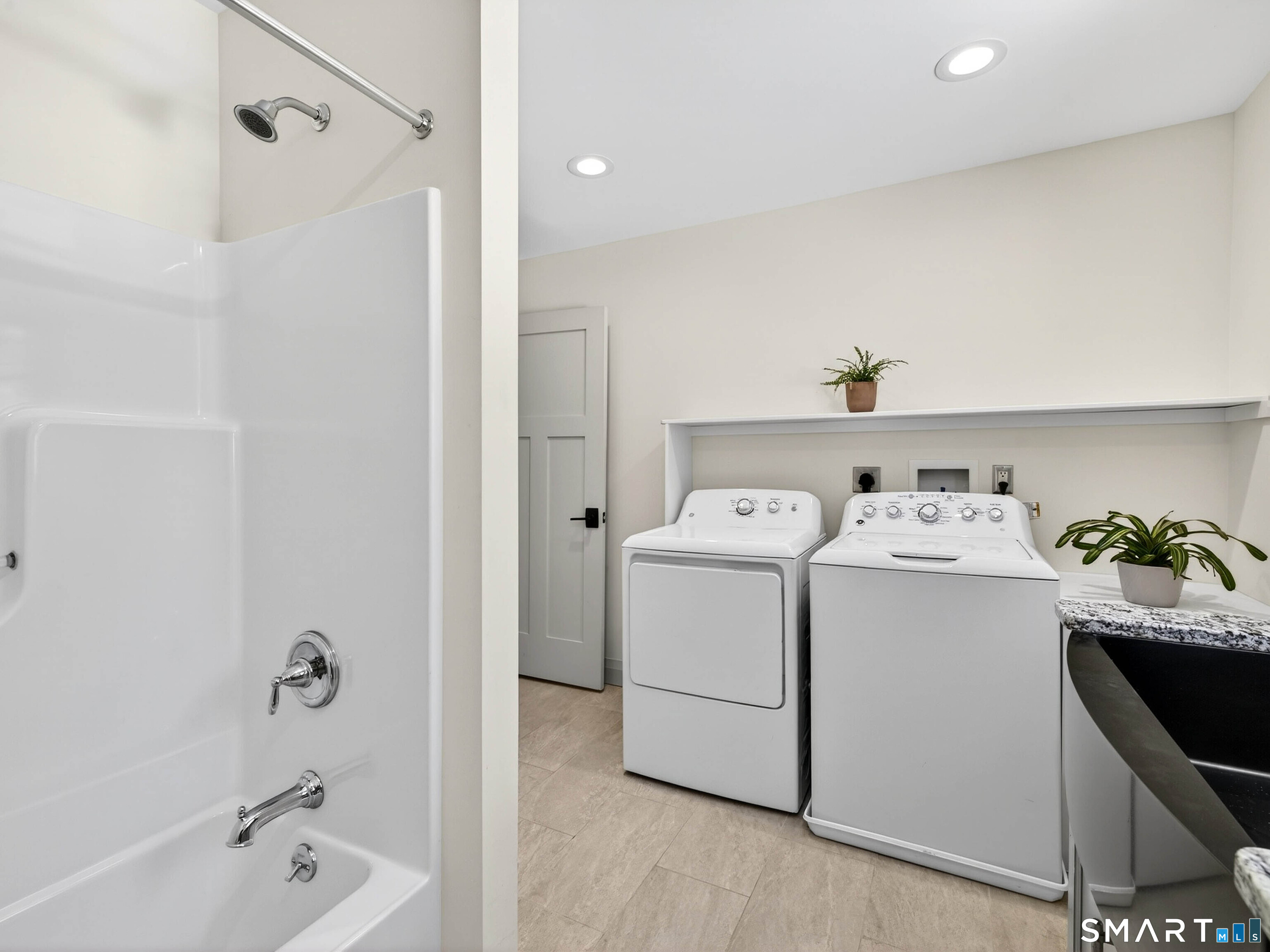 34-1 Johnny Cake Hill Road Old Lyme, CT 06371 - Photo 29 of 40 a utility room with dryer and washer