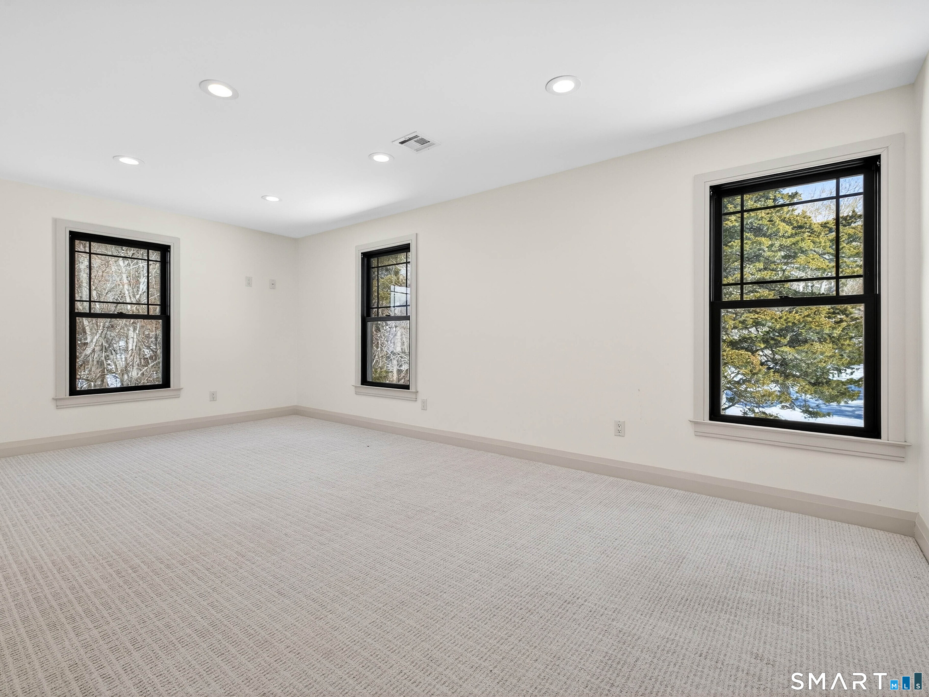 34-1 Johnny Cake Hill Road Old Lyme, CT 06371 - Photo 31 of 40 an empty room with windows and closet