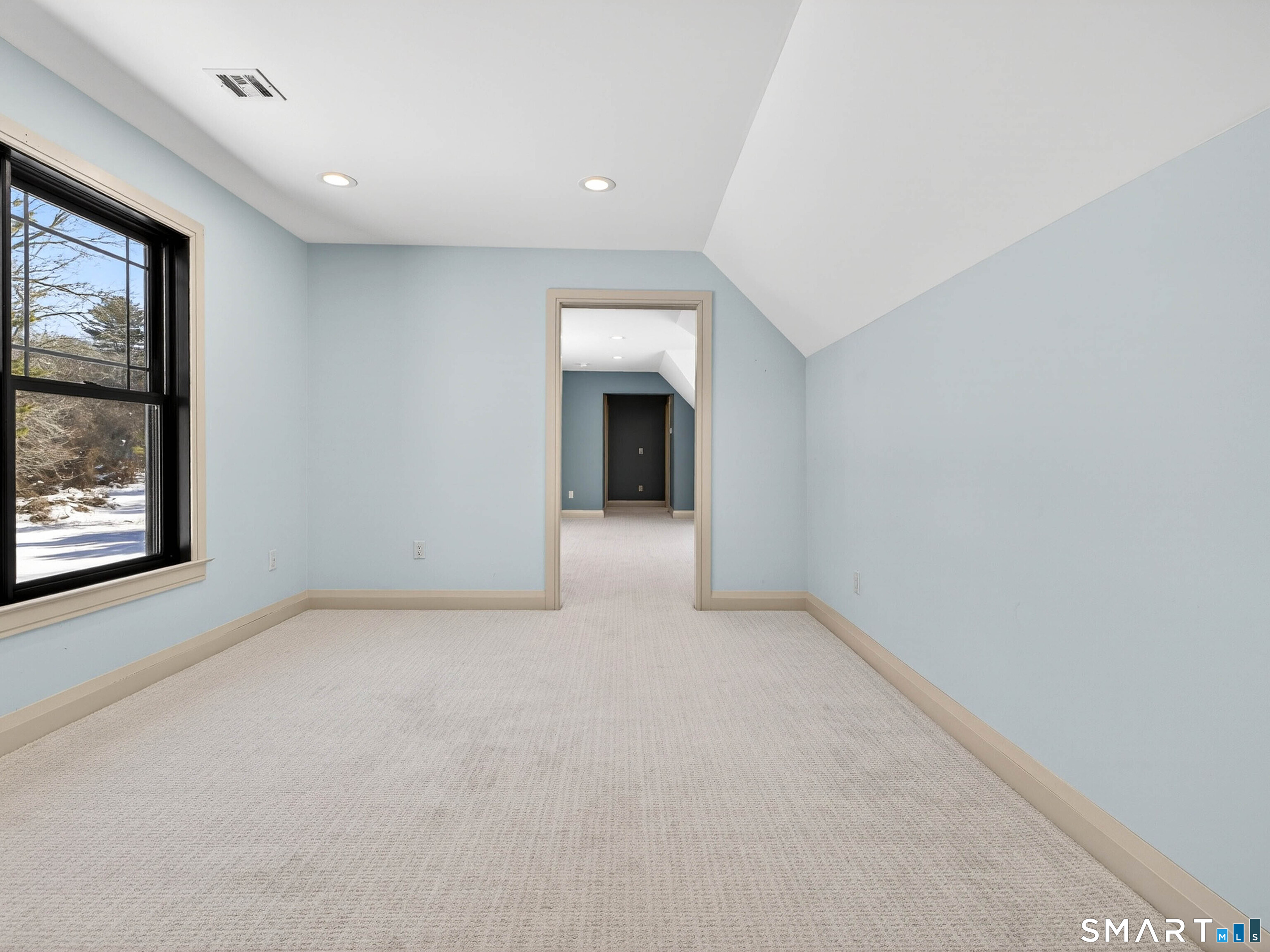 34-1 Johnny Cake Hill Road Old Lyme, CT 06371 - Photo 33 of 40 a view of a big room with windows and cabinet