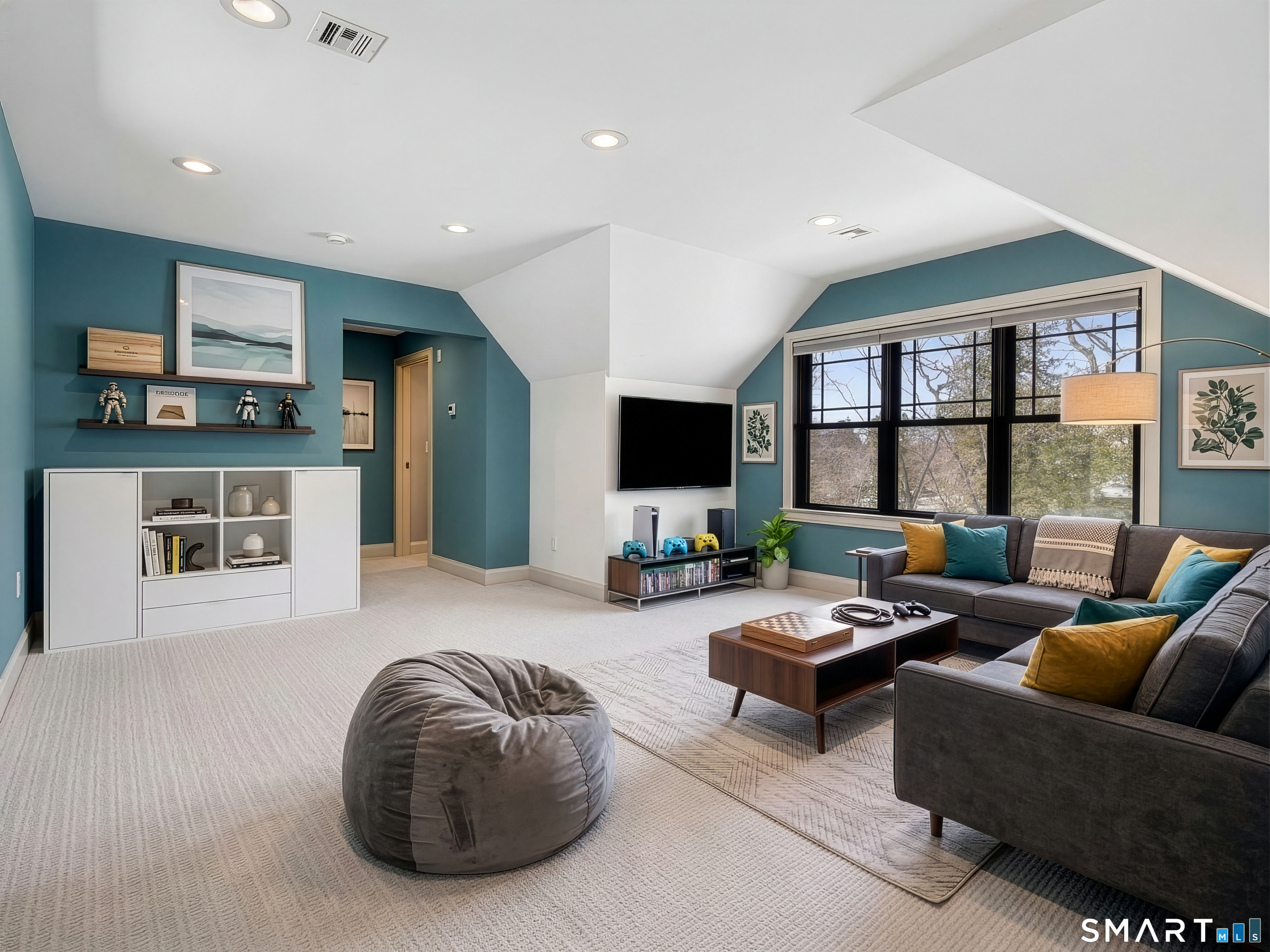 34-1 Johnny Cake Hill Road Old Lyme, CT 06371 - Photo 36 of 40 a living room with furniture and a flat screen tv