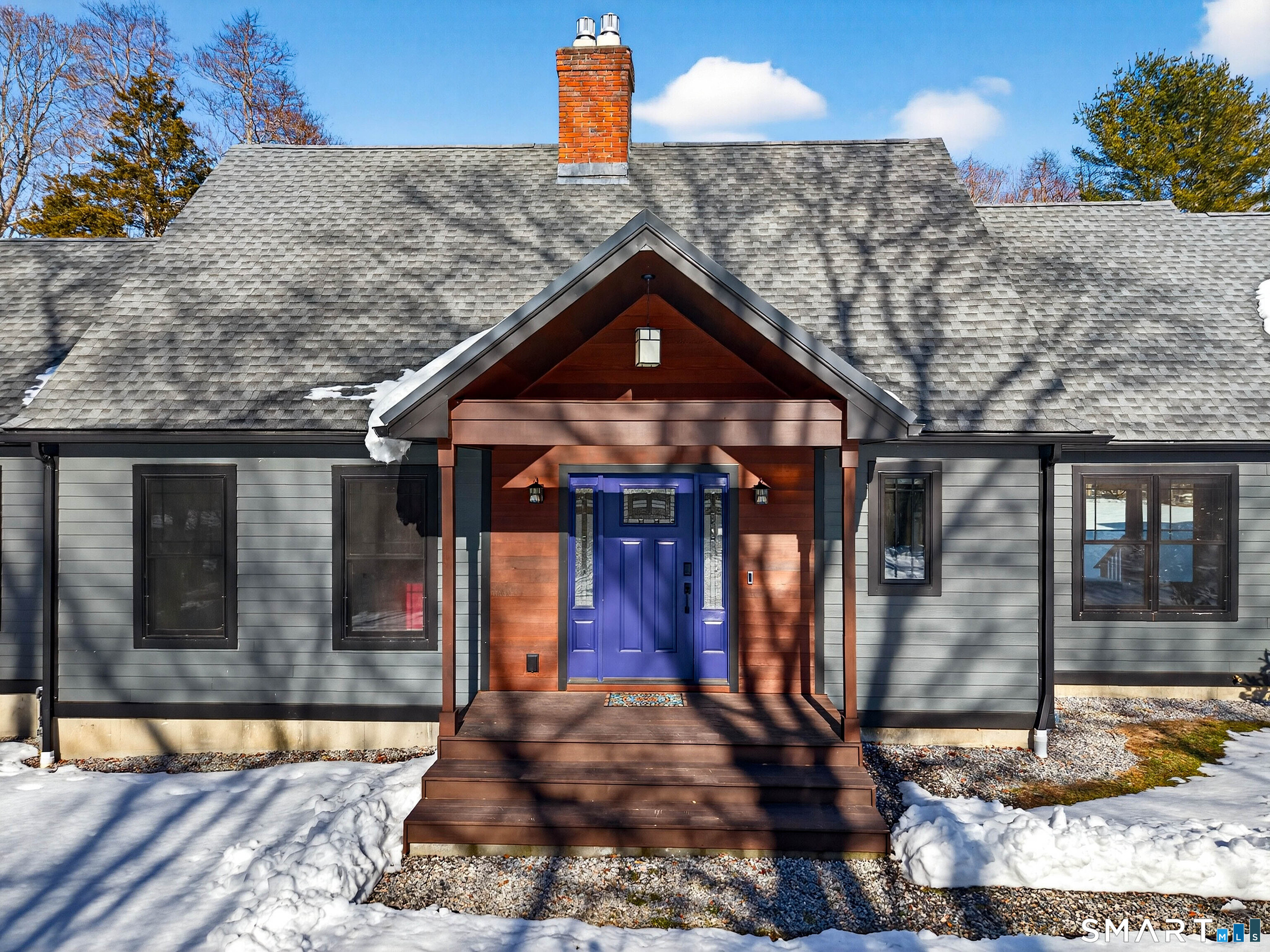 34-1 Johnny Cake Hill Road Old Lyme, CT 06371 - Photo 6 of 40 a front view of a house with garden