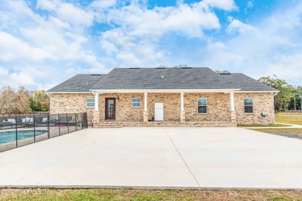 a house view with a garden space