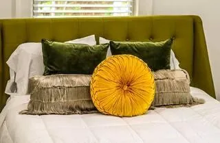 a view of a couch in a backyard