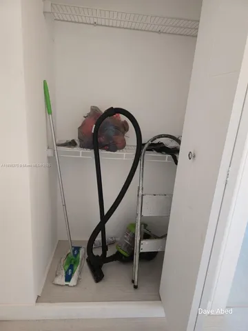 a view of staircase with white walls