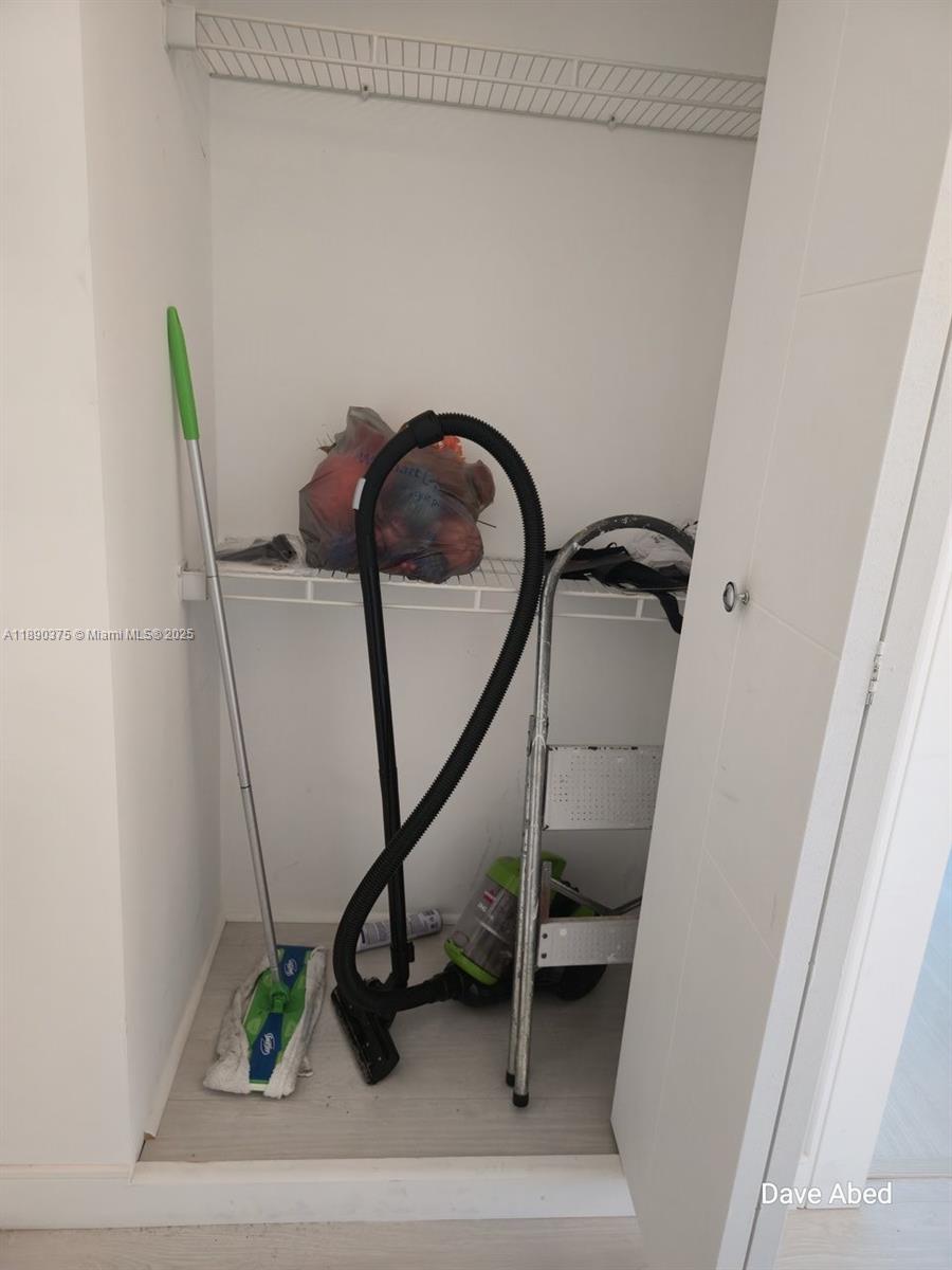 3600 Galt Ocean Drive, Unit 14C Fort Lauderdale, FL 33308 - Photo 15 of 22 a view of staircase with white walls